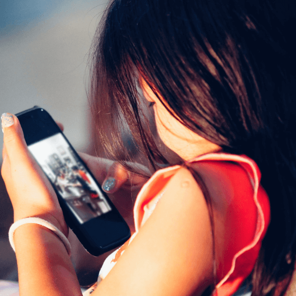 young girl on phone